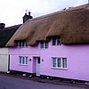 Rethatched terraced cottage in combed wheat reed, Maiden Newton
